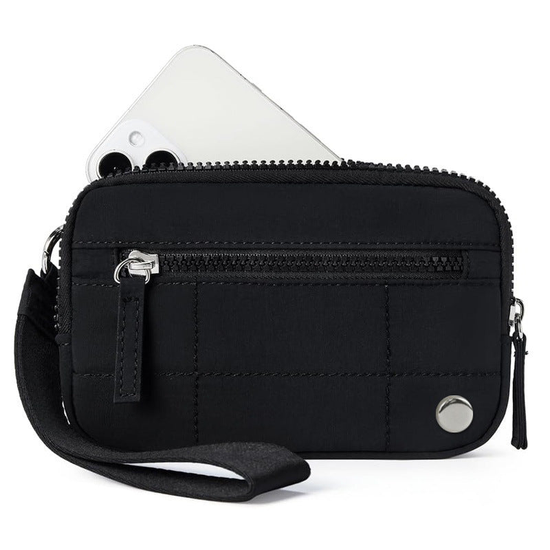 Black waterproof quilted handbag with wrist strap and front zipper, designed for both men and women in an urban simplicity style.